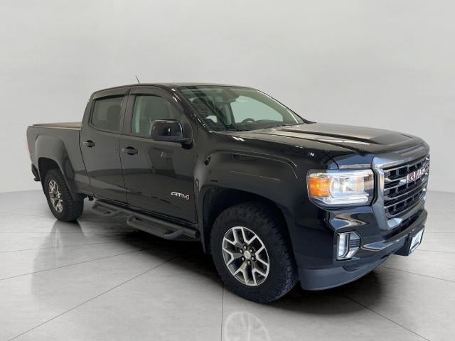 2022 GMC Canyon Crew Cab Long Box 4-Wheel Drive AT4 w/Cloth in Onyx Black — front three-quarter view