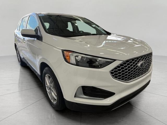 2024 Ford Edge SEL AWD in Star White Metallic Tri-Coat — front three-quarter view